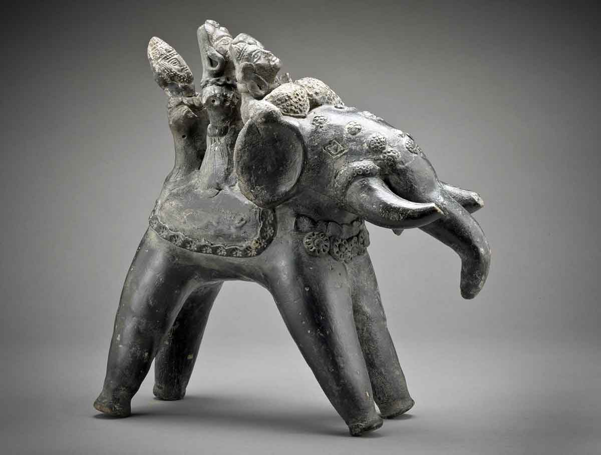 bronze elephant with riders